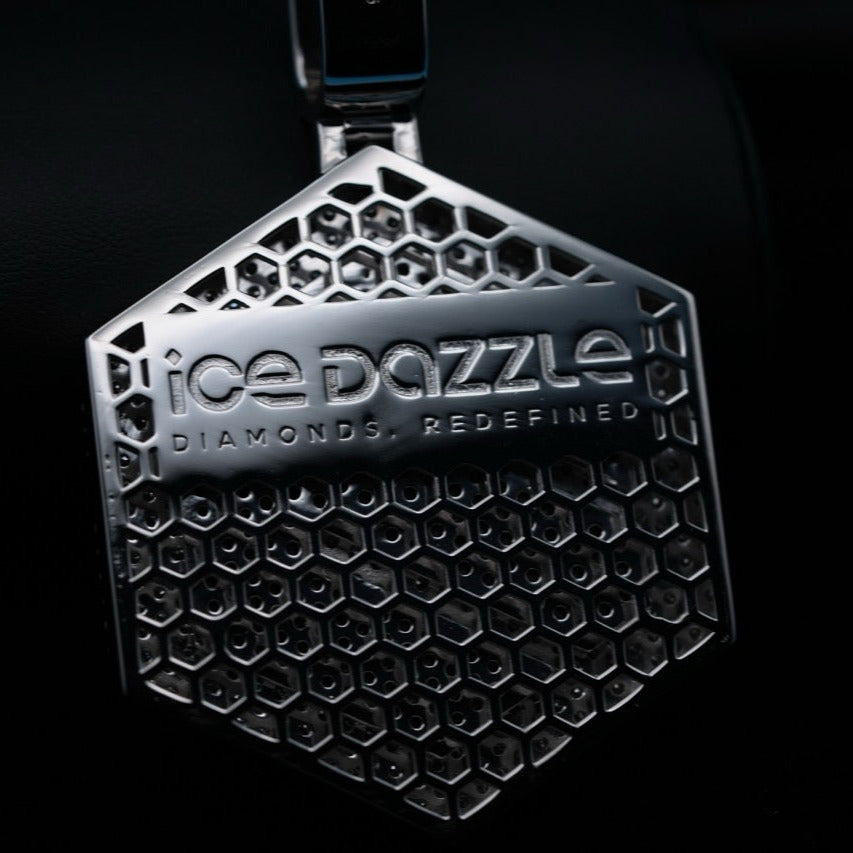 Macro close up shot of Ice Dazzle's signature logo on the back of a custom VVX™ pendant